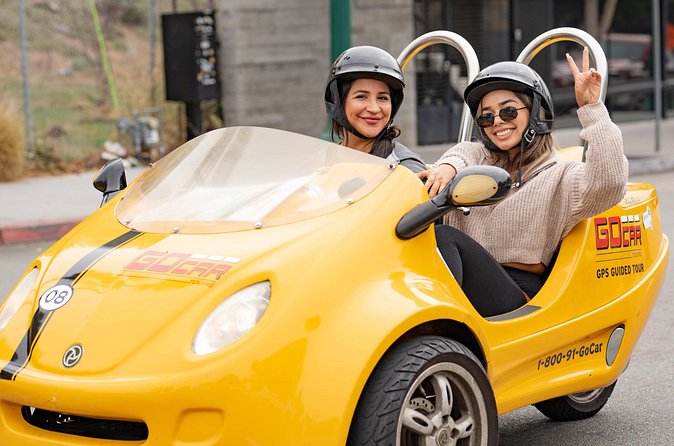 2-Hour GoCar Tour of Downtown and Balboa Park - Passing the USS Midway on the waterfront