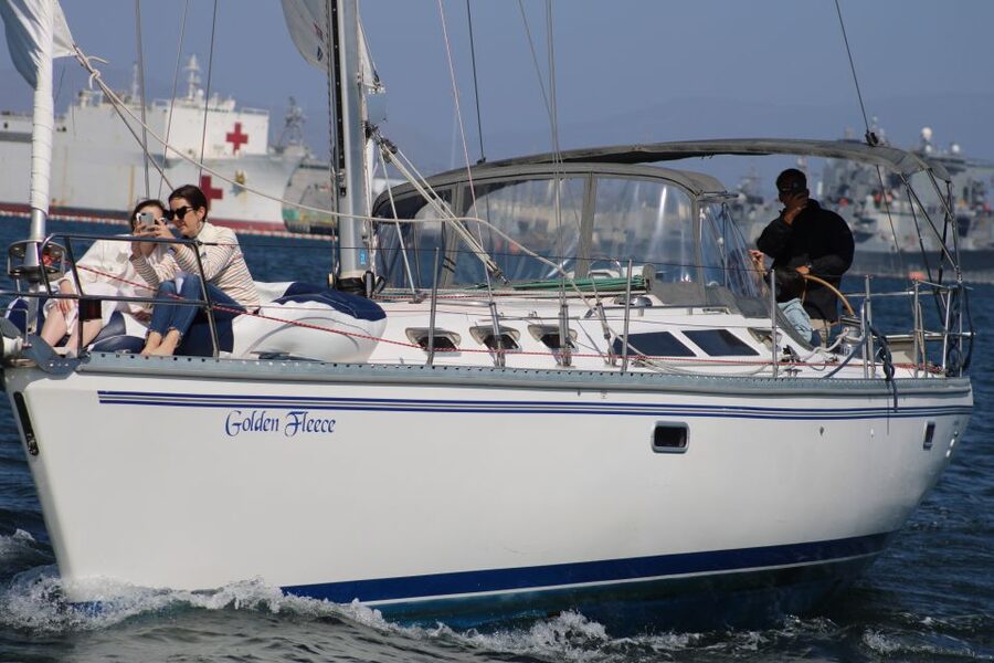 San Diego: San Diego Bay Sunset & Daytime Sailing Experience - The first views: skyline, ships, and the USS Midway